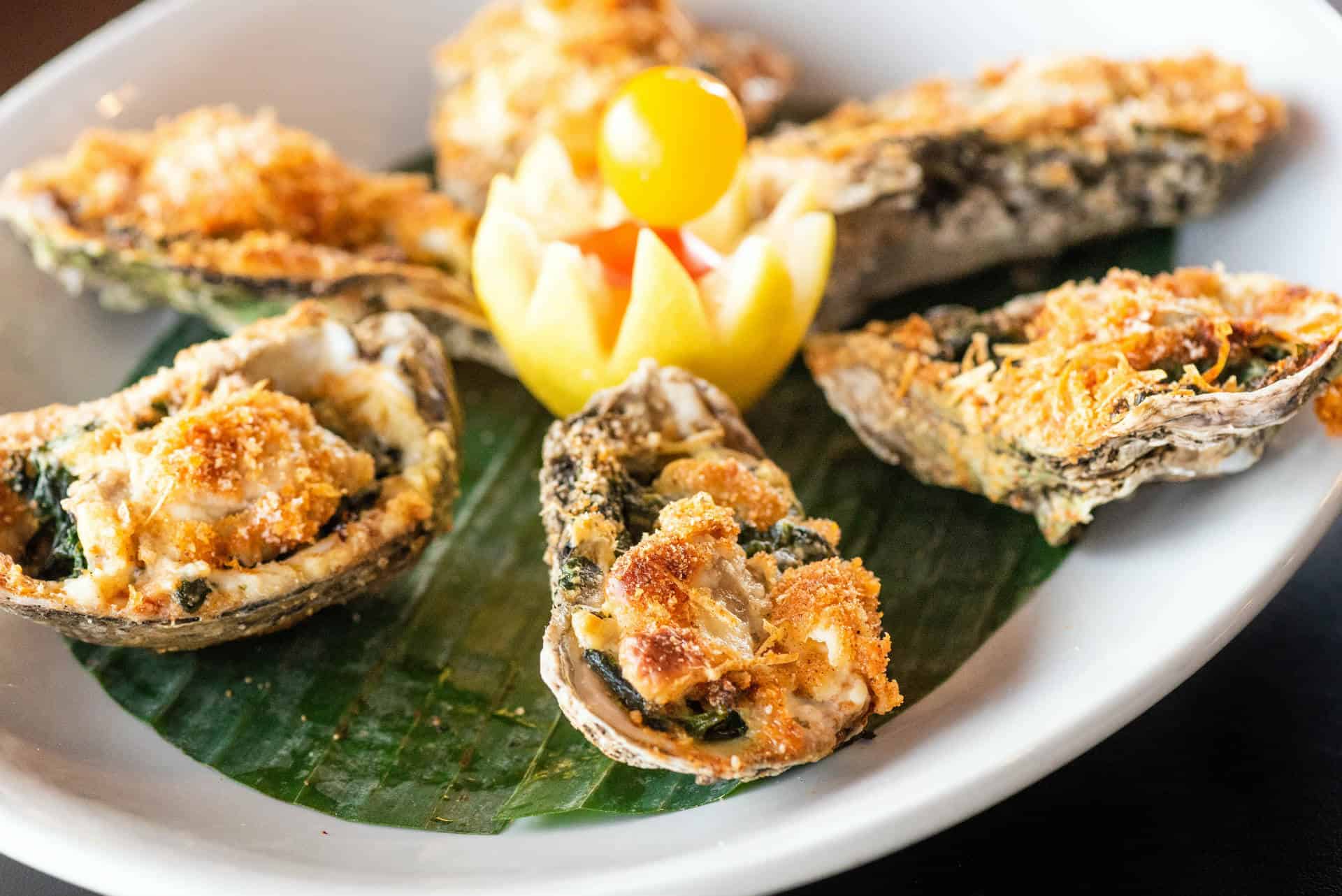 The Original Island Shrimp House Delicious fried oysters served with a lemon garnish at The Original Island Shrimp House.